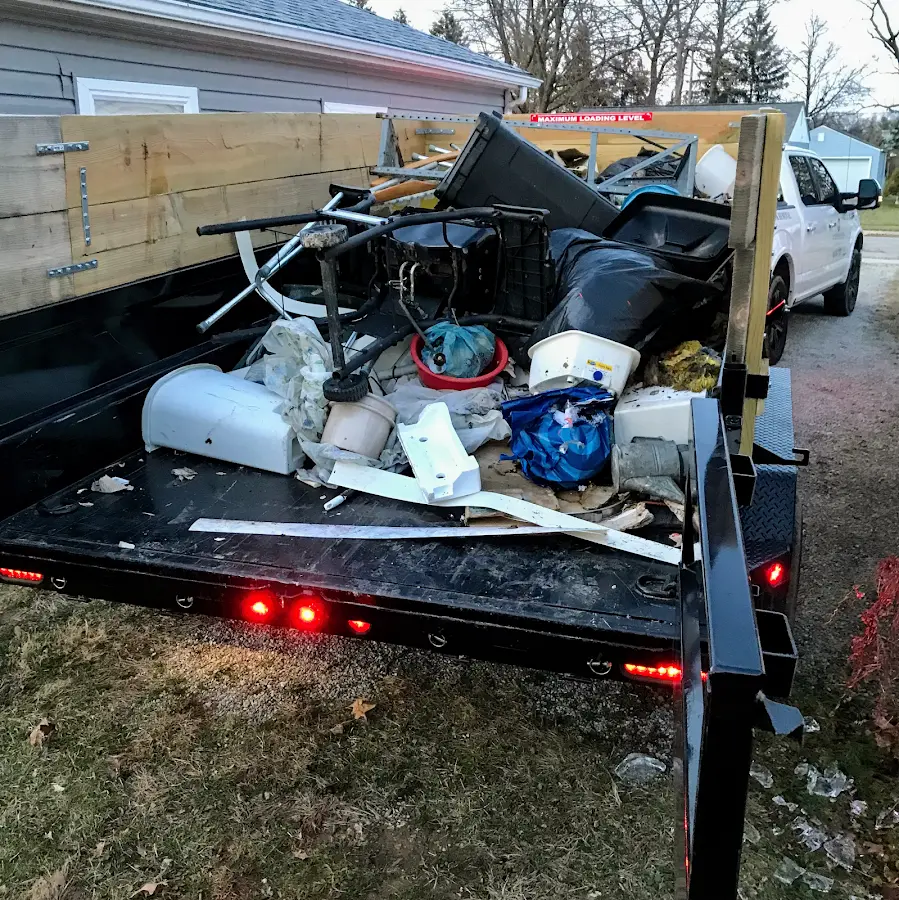 Roll-off dumpster delivered to a residential driveway in Lower Southampton
