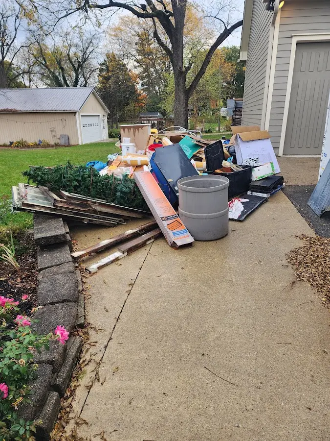 Dumpster being loaded with debris for 3 Yard Dumpster Rental in Lower Southampton